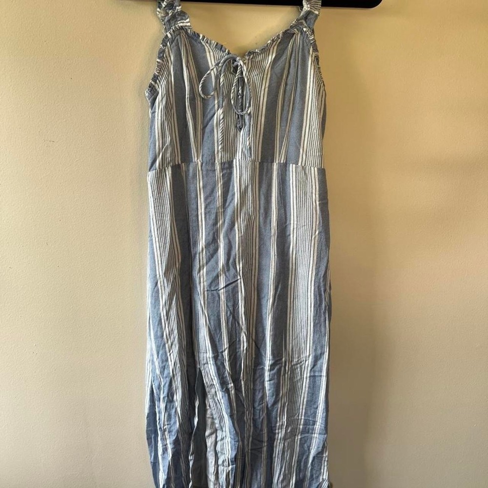 Summer is calling with this blue and white dress